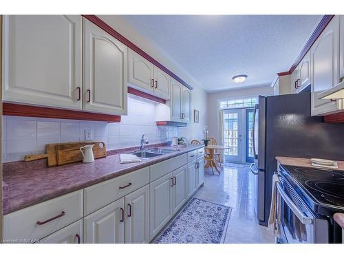 8-99 King Street, Tillsonburg, ON - Indoor Photo Showing Kitchen With Double Sink