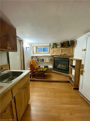 1169 Oxford Street E, London, ON - Indoor Photo Showing Kitchen With Fireplace