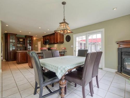 150 Fairview Crescent, Woodstock, ON - Indoor Photo Showing Dining Room With Fireplace