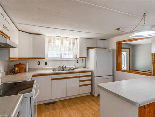 21 Tropicana-596101 Highway 59, East Zorra Tavistock, ON - Indoor Photo Showing Kitchen With Double Sink