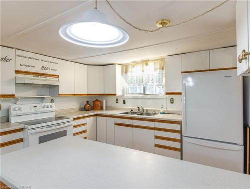 21 Tropicana-596101 Highway 59, East Zorra Tavistock, ON - Indoor Photo Showing Kitchen With Double Sink