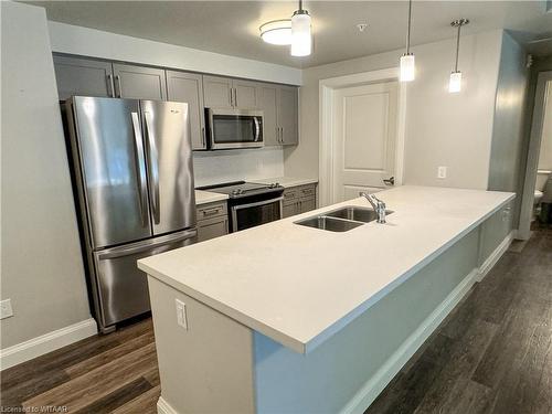 105-8 Centre Street, Norwich, ON - Indoor Photo Showing Kitchen With Stainless Steel Kitchen With Double Sink