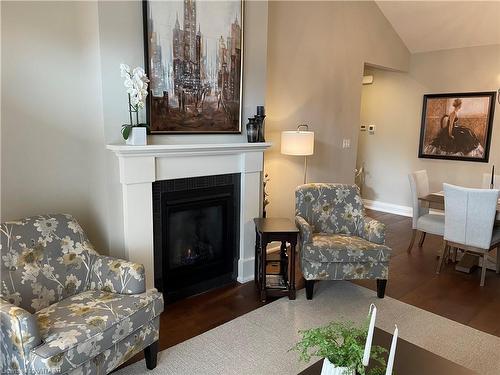 202-5 Wood Haven Drive, Tillsonburg, ON - Indoor Photo Showing Living Room With Fireplace