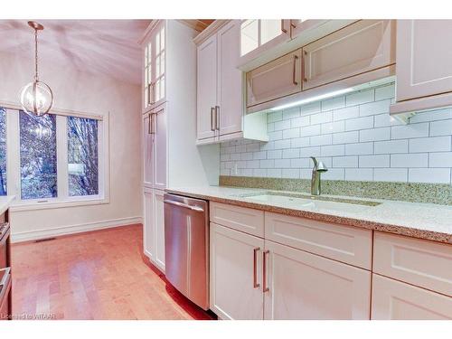 103-5 Wood Haven Drive, Tillsonburg, ON - Indoor Photo Showing Kitchen With Double Sink