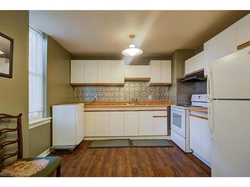 11-13 Victoria Street N, Woodstock, ON - Indoor Photo Showing Kitchen With Double Sink