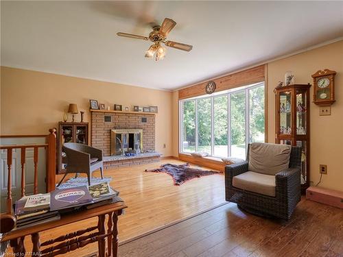 889 Norfolk County Rd 28, Norfolk County, ON - Indoor Photo Showing Living Room With Fireplace