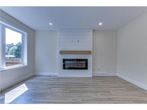 240 Fifth Avenue, Woodstock, ON - Indoor Photo Showing Living Room With Fireplace