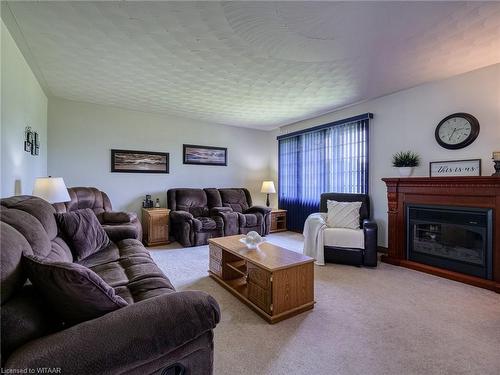 916 Norfolk County Road 28, Norfolk County, ON - Indoor Photo Showing Living Room With Fireplace