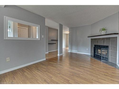 527 Springbank Avenue N, Woodstock, ON - Indoor Photo Showing Living Room With Fireplace