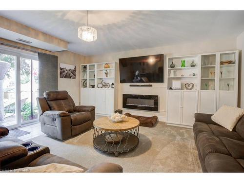 138 Dover Street, Woodstock, ON - Indoor Photo Showing Living Room With Fireplace