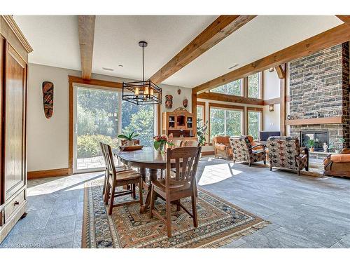 685856 Highway 2, Woodstock, ON - Indoor Photo Showing Dining Room With Fireplace