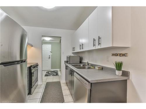 407-95 Baseline Road West, London, ON - Indoor Photo Showing Kitchen With Double Sink