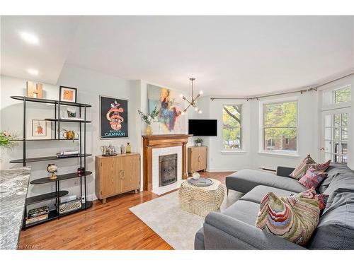 204-275 Queens Avenue, London, ON - Indoor Photo Showing Living Room With Fireplace