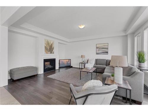 798 Queenston Blvd Boulevard, Woodstock, ON - Indoor Photo Showing Living Room With Fireplace