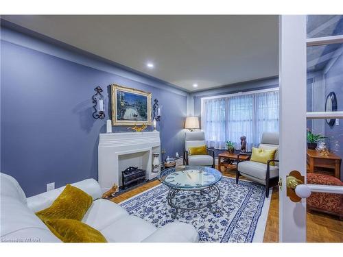 102 Wyndham Crescent, London, ON - Indoor Photo Showing Living Room With Fireplace