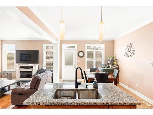 78 Oliver Crescent, Thamesford, ON - Indoor Photo Showing Kitchen With Fireplace With Double Sink With Upgraded Kitchen