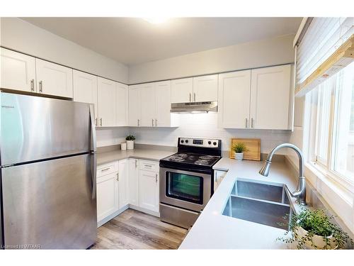 7-388 Springbank Avenue N, Woodstock, ON - Indoor Photo Showing Kitchen With Double Sink