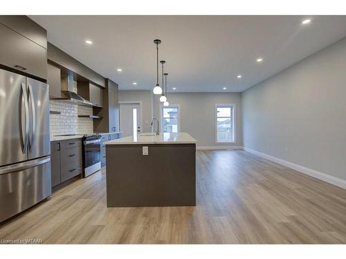 102-361 Quarter Town Line, Tillsonburg, ON - Indoor Photo Showing Kitchen With Stainless Steel Kitchen With Upgraded Kitchen