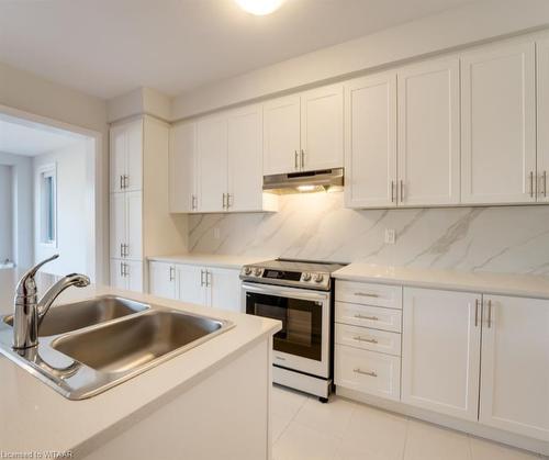 1427 Upper Thames Drive, Woodstock, ON - Indoor Photo Showing Kitchen With Double Sink