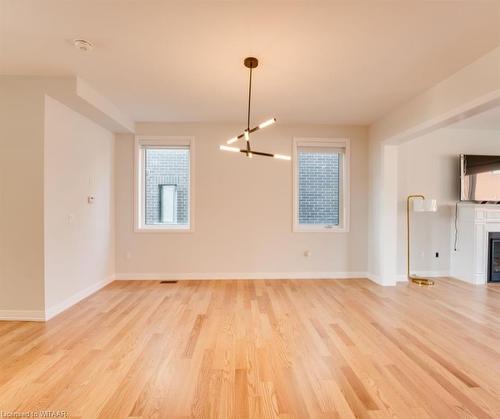 1427 Upper Thames Drive, Woodstock, ON - Indoor Photo Showing Other Room With Fireplace