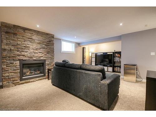 112 Ottawa Avenue, Woodstock, ON - Indoor Photo Showing Living Room With Fireplace