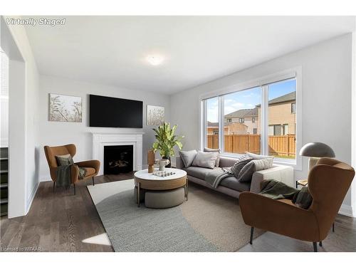 1323 Upper Thames Drive, Woodstock, ON - Indoor Photo Showing Living Room With Fireplace