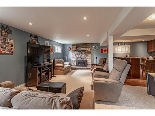 191 Diefenbaker Drive, Woodstock, ON - Indoor Photo Showing Living Room With Fireplace