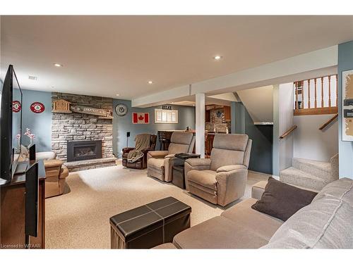 191 Diefenbaker Drive, Woodstock, ON - Indoor Photo Showing Living Room With Fireplace