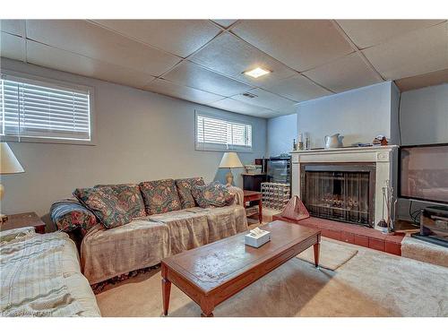 641 Durham Crescent, Woodstock, ON - Indoor With Fireplace