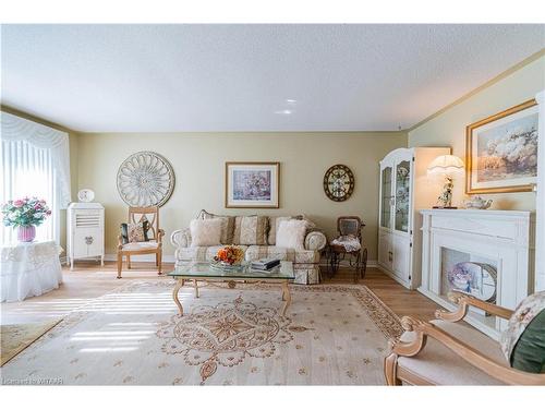 24 Allen Street, Tillsonburg, ON - Indoor Photo Showing Living Room With Fireplace