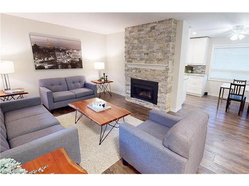 35 Altadore Crescent, Woodstock, ON - Indoor Photo Showing Living Room With Fireplace