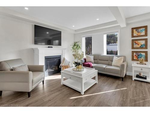 27 Muma Street, Drumbo, ON - Indoor Photo Showing Living Room With Fireplace