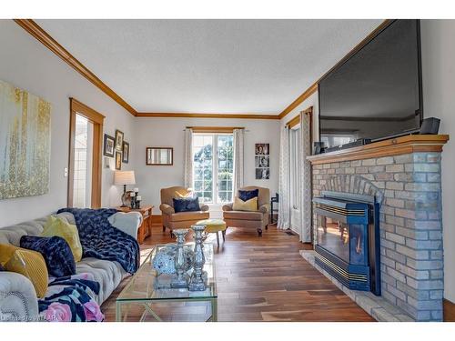 583511 Hamilton Road, Ingersoll, ON - Indoor Photo Showing Living Room With Fireplace