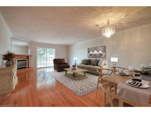 18-53 Herons Landing Crescent, Woodstock, ON - Indoor Photo Showing Living Room With Fireplace