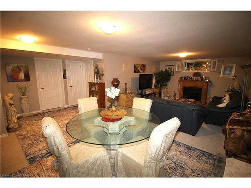 5-150 Oak Street, Simcoe, ON - Indoor Photo Showing Dining Room With Fireplace