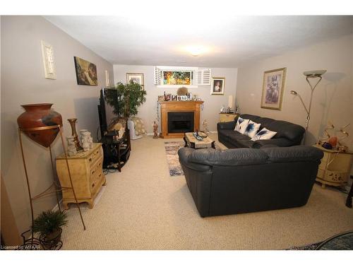 5-150 Oak Street, Simcoe, ON - Indoor Photo Showing Other Room With Fireplace