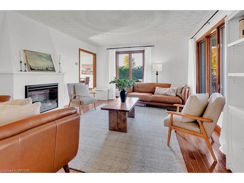 1554 Mall Road, Norfolk County, ON - Indoor Photo Showing Living Room With Fireplace