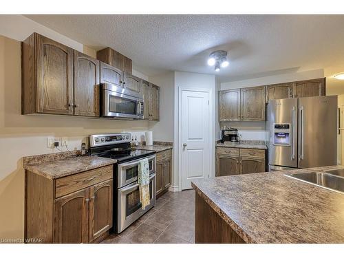 1154 Caen Avenue, Woodstock, ON - Indoor Photo Showing Kitchen With Double Sink