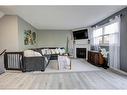 3-21 Wren Court, Tillsonburg, ON  - Indoor Photo Showing Living Room With Fireplace 