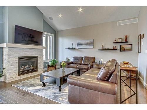 233 Wedgewood Drive, Woodstock, ON - Indoor Photo Showing Living Room With Fireplace