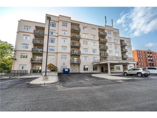 101-80 Bridge Street E, Tillsonburg, ON - Outdoor With Balcony With Facade