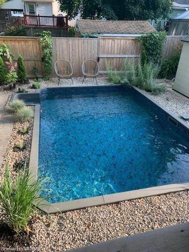 675 Elizabeth Street, Woodstock, ON - Outdoor With In Ground Pool With Backyard