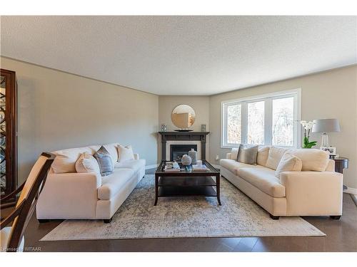 90 Weston Drive, Tillsonburg, ON - Indoor Photo Showing Living Room With Fireplace