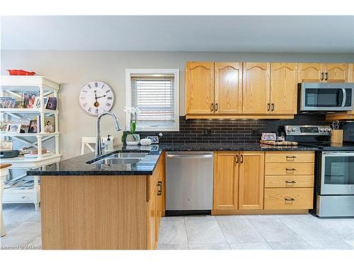 90 Weston Drive, Tillsonburg, ON - Indoor Photo Showing Kitchen With Double Sink