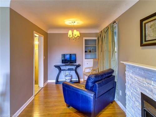 90 Earlscourt Crescent, Woodstock, ON - Indoor With Fireplace