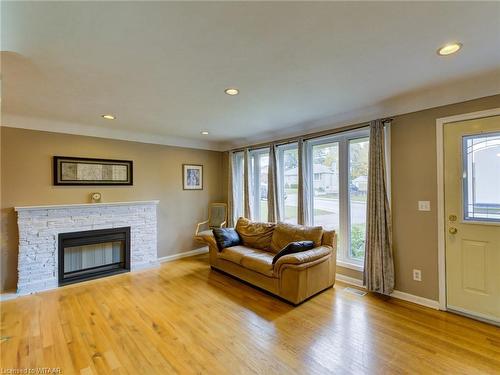 90 Earlscourt Crescent, Woodstock, ON - Indoor Photo Showing Living Room With Fireplace