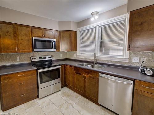 90 Earlscourt Crescent, Woodstock, ON - Indoor Photo Showing Kitchen With Stainless Steel Kitchen With Double Sink