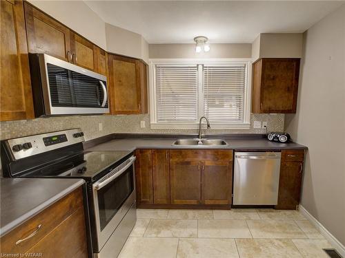 90 Earlscourt Crescent, Woodstock, ON - Indoor Photo Showing Kitchen With Stainless Steel Kitchen With Double Sink