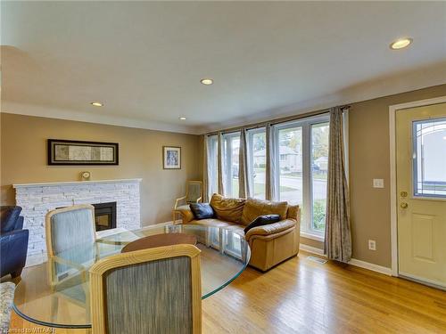 90 Earlscourt Crescent, Woodstock, ON - Indoor Photo Showing Living Room With Fireplace