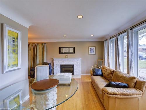 90 Earlscourt Crescent, Woodstock, ON - Indoor Photo Showing Living Room With Fireplace